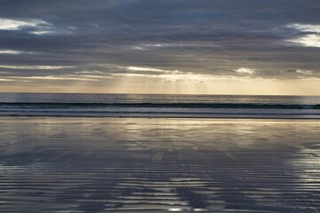 Fototapeta na wymiar Ocean Beach in Dusk Twilight