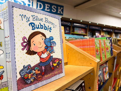 Herceg-Novi, Montenegro - 17 august 2023: Colorful book is on the shelf in the store. Caption: My blue bunny Bubbit