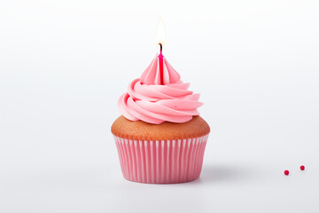 A pink birthday cupcake with candle on white background