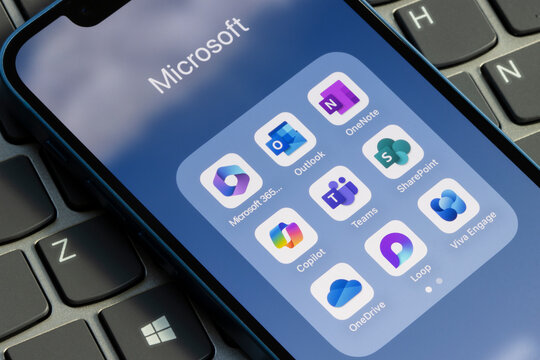 Portland, OR, USA - Jan 1, 2024: Assorted Microsoft apps, including Microsoft 365, Outlook, OneNote, Copilot, Teams, SharePoint, OneDrive, Loop, and Viva Engage, are seen on an iPhone.