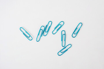 Colorful paper clip isolated on white background