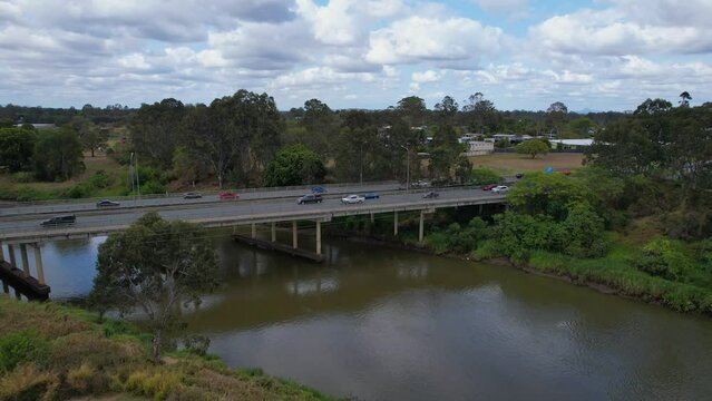 Vehicles Driving On Larry Storey Bridge Across Logan River In Brisbane, Queensland, Australia. aerial pan right