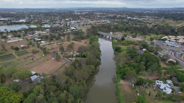 Traffic Crossing Logan River Via Larry Storey Bridge In Waterford, Queensland, Australia. aerial shot