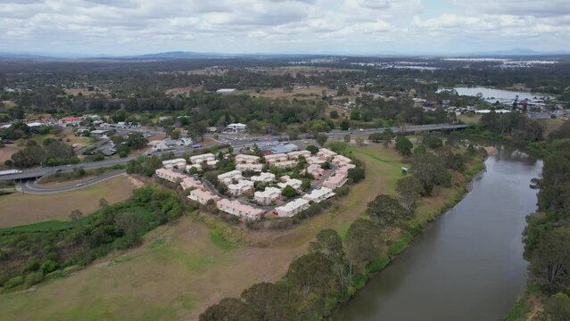 Business Buildings Near L Story Park And Larry Storey Bridge In Waterford, QLD, Australia. aerial shot