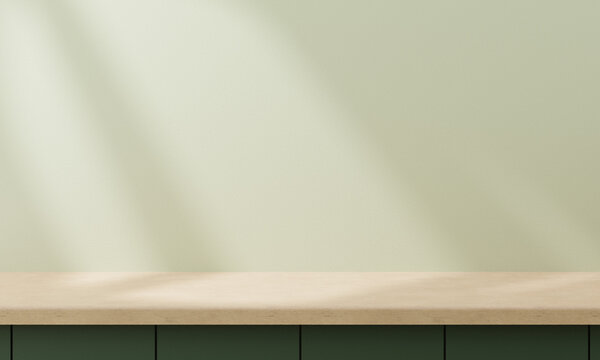 Minimal cozy counter mockup design for product presentation background.Branding in modern style with wood top green counter and cozy pastel wall with soft ray light .Kitchen interior 3D render.