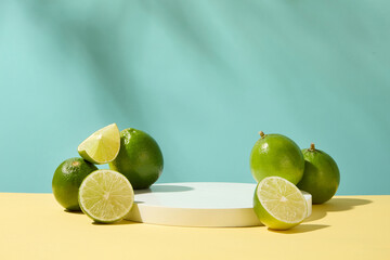 Fresh lemons are placed next to a white podium on a pastel background. The acid in lemon has...