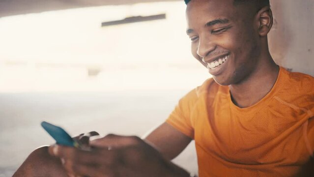 Black man, smartphone and chat on social media after exercise, email or texting with communication and tech. Fitness person using phone, mobile app and connectivity with internet search and happiness