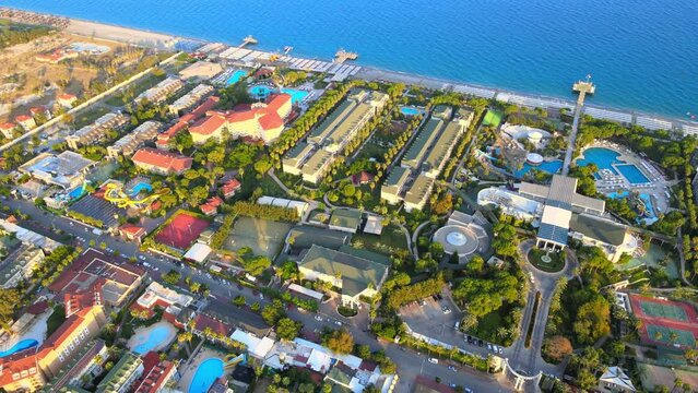 Aerial 4K drone footage of Kiriş-
Kemer (Antalya, Turkey).  Mediterranean sea, beach, cityscape (hotels and resorts), and mountains &ndash; filmed in a vibrant summer time.