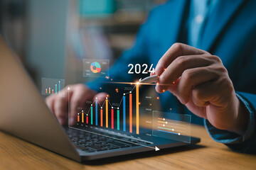 Businessman investor analyzes profitability of working companies with digital augmented reality graphics, positive indicators in 2024, businessman calculates financial data for long-term investments.