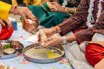 Indian Hindu wedding ceremony Ganesh pooja rituals close ups
