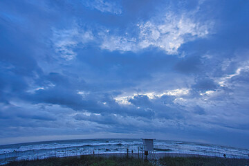 Fototapeta na wymiar Winter storm clouds over the ocean in Indialantic Florida