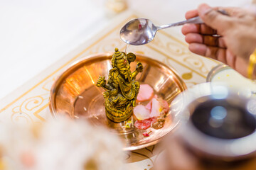 Indian Hindu wedding ceremony Ganesh pooja rituals close ups