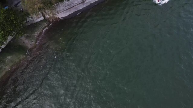 Aerial view, you can see boats moving fast. was on the Sarangan Lake tourist attraction "Sarangan Lake" in Magetan, East Java, Indonesia.