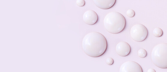 cosmetic smears drops of cream texture on pastel pink background