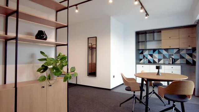 Simple student-style dorm dining room and kitchen. Hostel dormitory room. Campus. Hotel