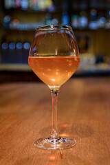 A glass of orange wine, Gewurztraminer and Riesling blend at a traditional winstub restaurant in...