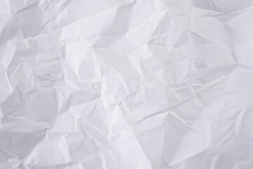 White crumpled paper texture background, clean white wrinkled paper, top view.