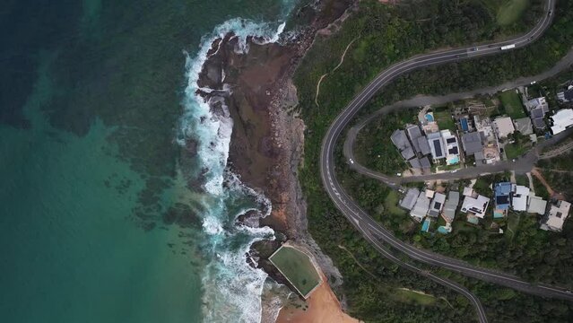 beautiful bigoli beach drone footage rock pool golden sand turquoise sea 4k Sydney Australia