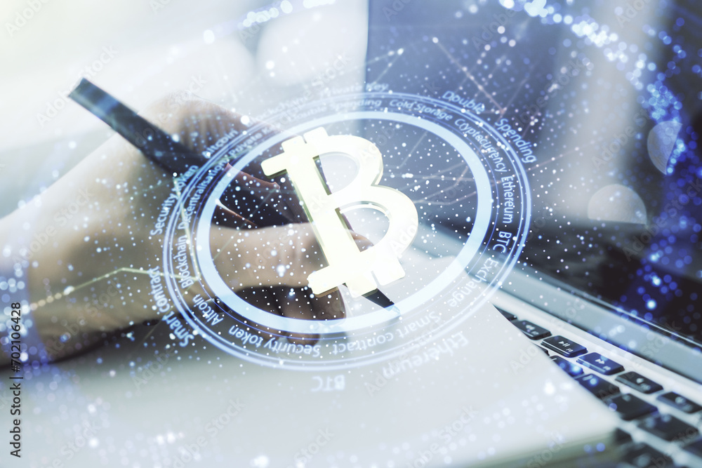 Poster double exposure of creative bitcoin symbol with hand writing in notebook on background with laptop. 