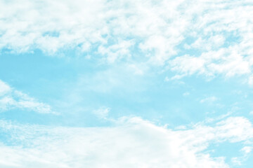 Blue pastel sky with white fluffy cloud. Cloudscape background. Autumn, Summer, Spring time season sky. Peaceful Calm Relaxation Freedom of life and Positive Energy Concepts. Copy space. 