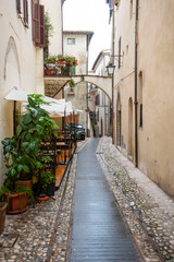Fototapeta na wymiar Pedestrian Alley in Spoleto - Italy