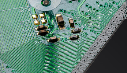 Close up of components and microchips on PC circuit board.