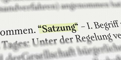 Das Wort Satzung im Buch mit Textmarker markiert