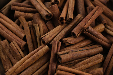 Heap of cinnamon sticks, close up