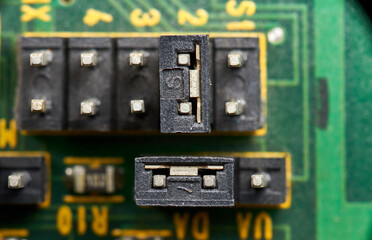 Detail of old electronic components soldered to its motherboard