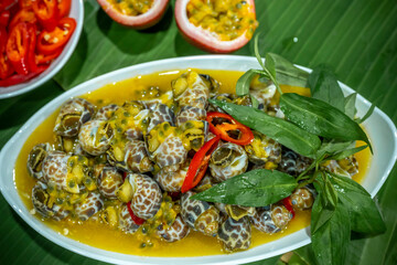 Steamed Spotted Babylon Blanching (Fresh Sea Babylonia Areolata Shell Boiled) served with passion...