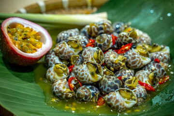 Steamed Spotted Babylon Blanching (Fresh Sea Babylonia Areolata Shell Boiled) served with passion...