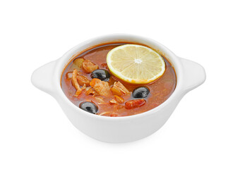 Meat solyanka soup with sausages, olives and vegetables in bowl isolated on white