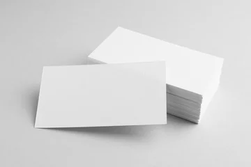 Fotobehang Blank business cards on light grey background. Mockup for design © New Africa