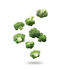 Fresh green broccoli falling on white background