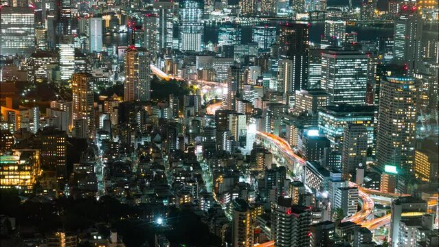 Timelapse of night traffic through cityscape of Tokyo in Japan