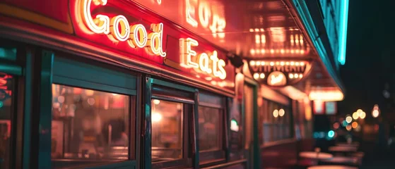 Zelfklevend Fotobehang A Retrostyle Diner Sign With Neon Lights Reading Good Eats © Ян Заболотний