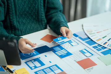 Creative team web designer planning application development for web mobile phone at modern...