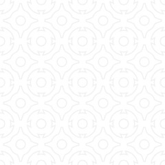 Seamless ornament made of gray circles and patterns in a trendy style. Mosaic of white geometric elements for textiles and wallpaper.	