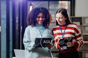 Agile development methodology concept. Business hand using laptop computer and tablet with virtual...