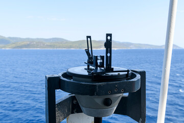 Azimuth ring on gyro compass. Direction finder on the navigational bridge. Azimuth vane. Bearing...