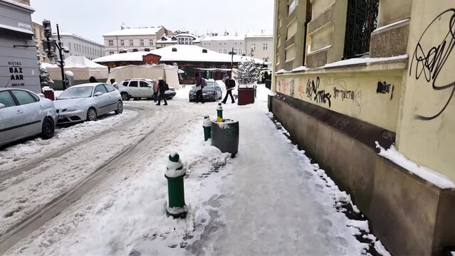 Plac Nowy city market, in the Jewish district. Krakow on a winter, snowy day. Europe
