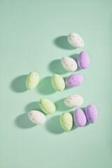 Easter eggs dotted on a blue background