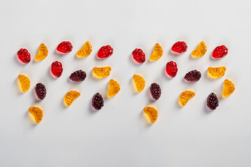 Assorted gummy candies, Juicy colorful jelly sweets. Gummy candies on white background