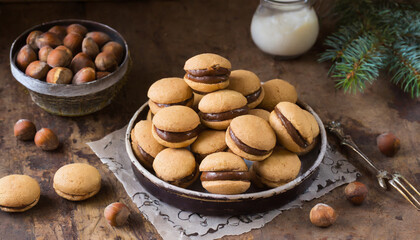 Baci di dama italian hazelnut biscuits cookies with chocolate cream, rustic style