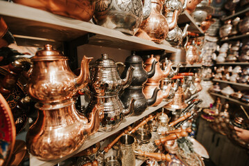 many traditional turkish copper teapot in a handicraft shop