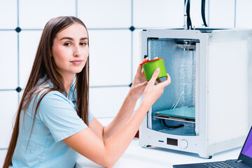 Female College Student Printing 3D Object