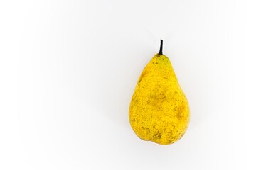 The image features a radiant yellow pear set against a clean white backdrop. The vibrant yellow hue of the pear contrasts elegantly with the pure white background.
