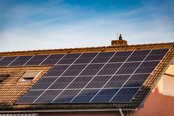 Photovoltaic panels on the roof of family house, solar panels.