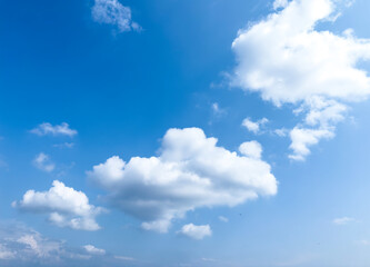 Naklejka na ściany i meble White cloudy blue summer sky