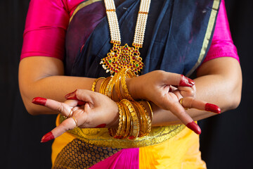 Bharatanatyam mudra performed by woman Indian classical dancer
